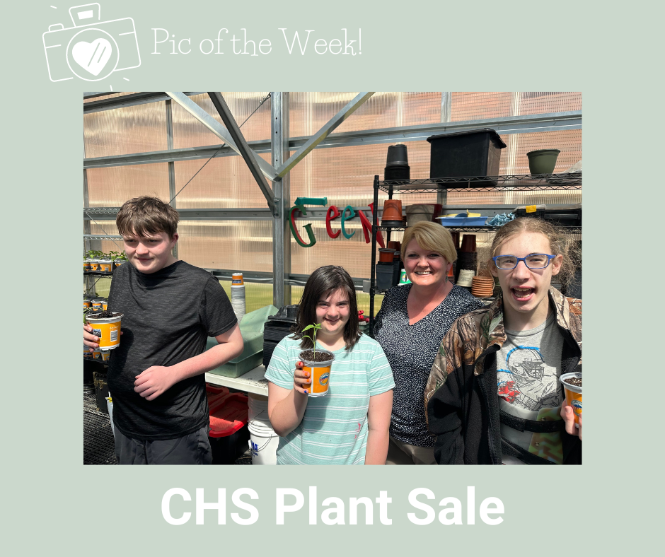 Photo of three CHS students holding plants in a greenhouse with a teacher in the background with graphic reading: Pic of the week. CHS Plant Sale