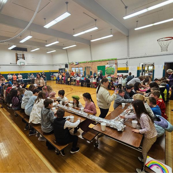 Photo of Warren Elementary students eating a 100 foot long Sundae